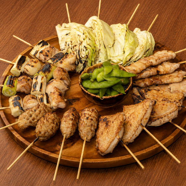 Grilled yakitori skewers at Sumibi Ineya Saigon, a Japanese izakaya serving charcoal-grilled dishes and casual dining.