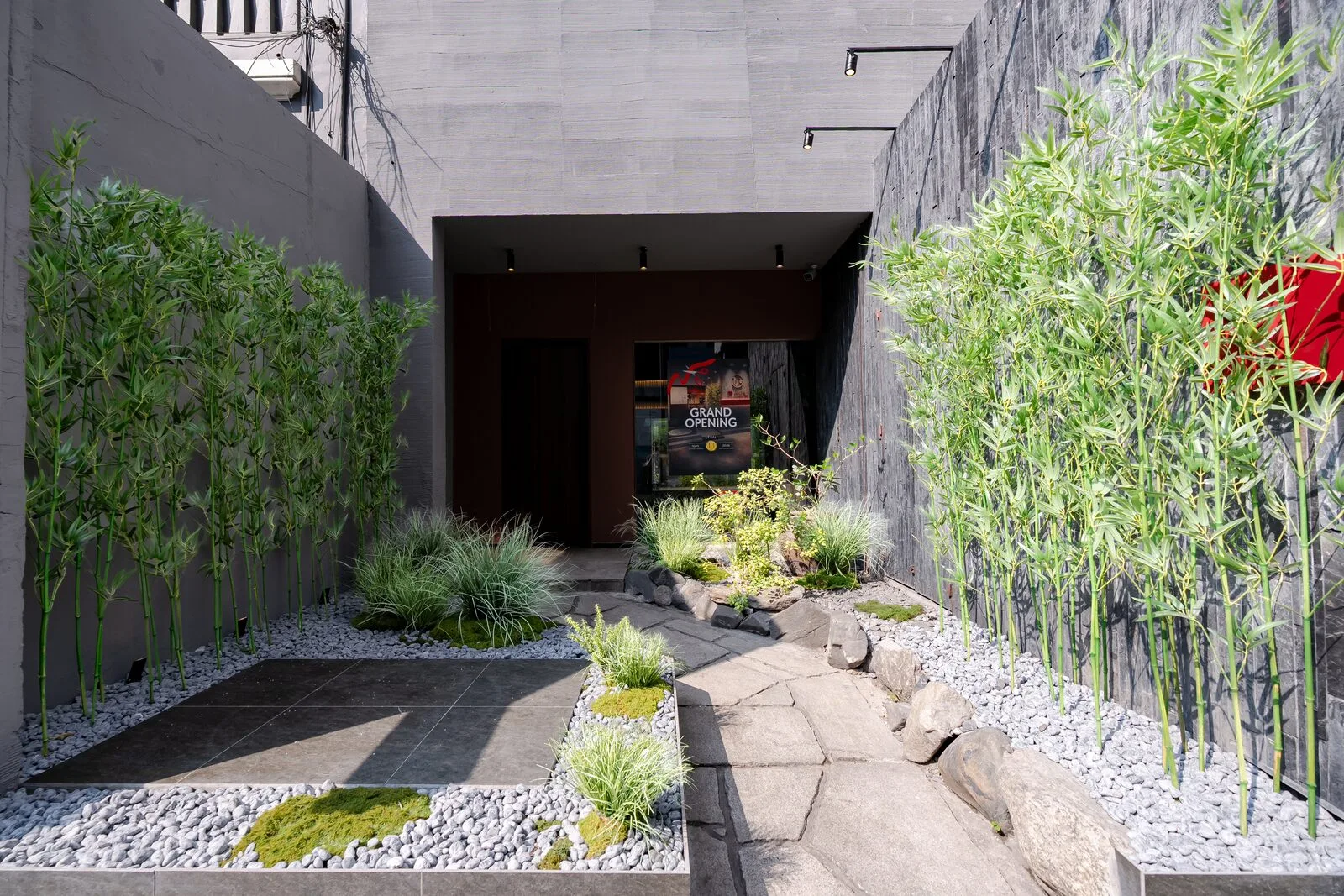 The restaurant entrance through a bamboo courtyard
